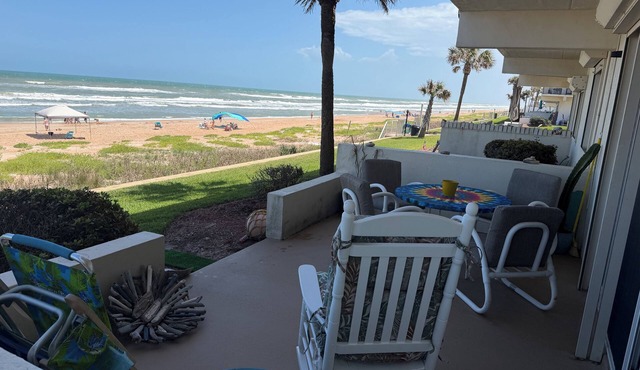 SunCatcher Oceanfront condo in Ormond by the Sea. Walk right out onto the beach.