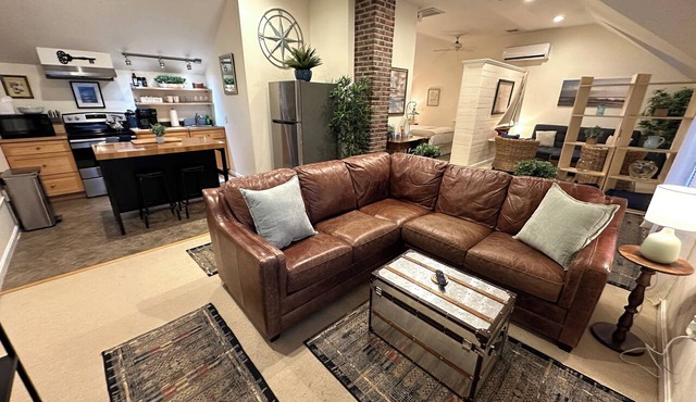 Unwind in harbor luxury at this sophisticated studio in Newport's Yachting Village! Cozy queen bed + pull-out sofa bed, fully stocked kitchen, huge deck with sunset harbor views, mini-split AC, TV, off-street parking. Steps to marinas, Thames Street