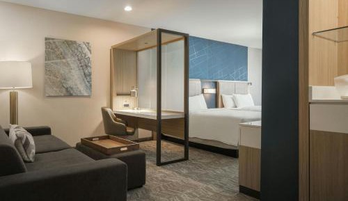 Queen Suite with Two Queen Beds, Roll-In Shower and Trundle Sofa - Mobility Access